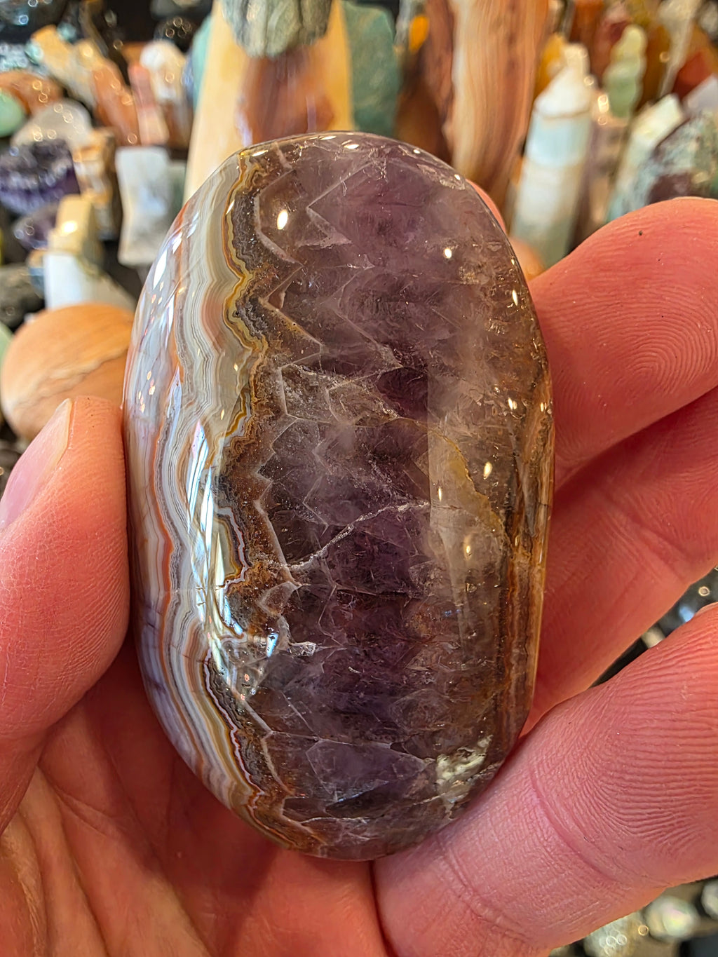 Crazy Lace Agate in Amethyst Palm Stone