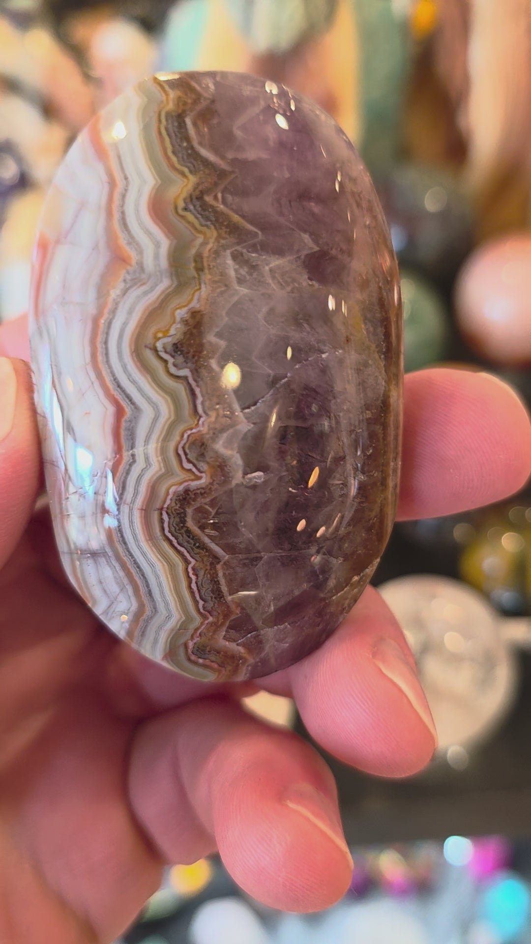 Crazy Lace Agate in Amethyst Palm Stone